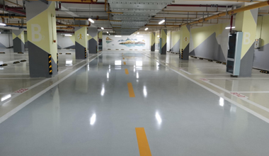 谈球吧体育官网入口浮动彩砂自流平地坪，倾力装扮武汉光谷生物医药创新中心地下车库